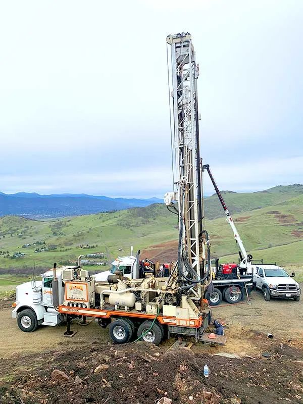 Water well drilling rig on site in Arizona